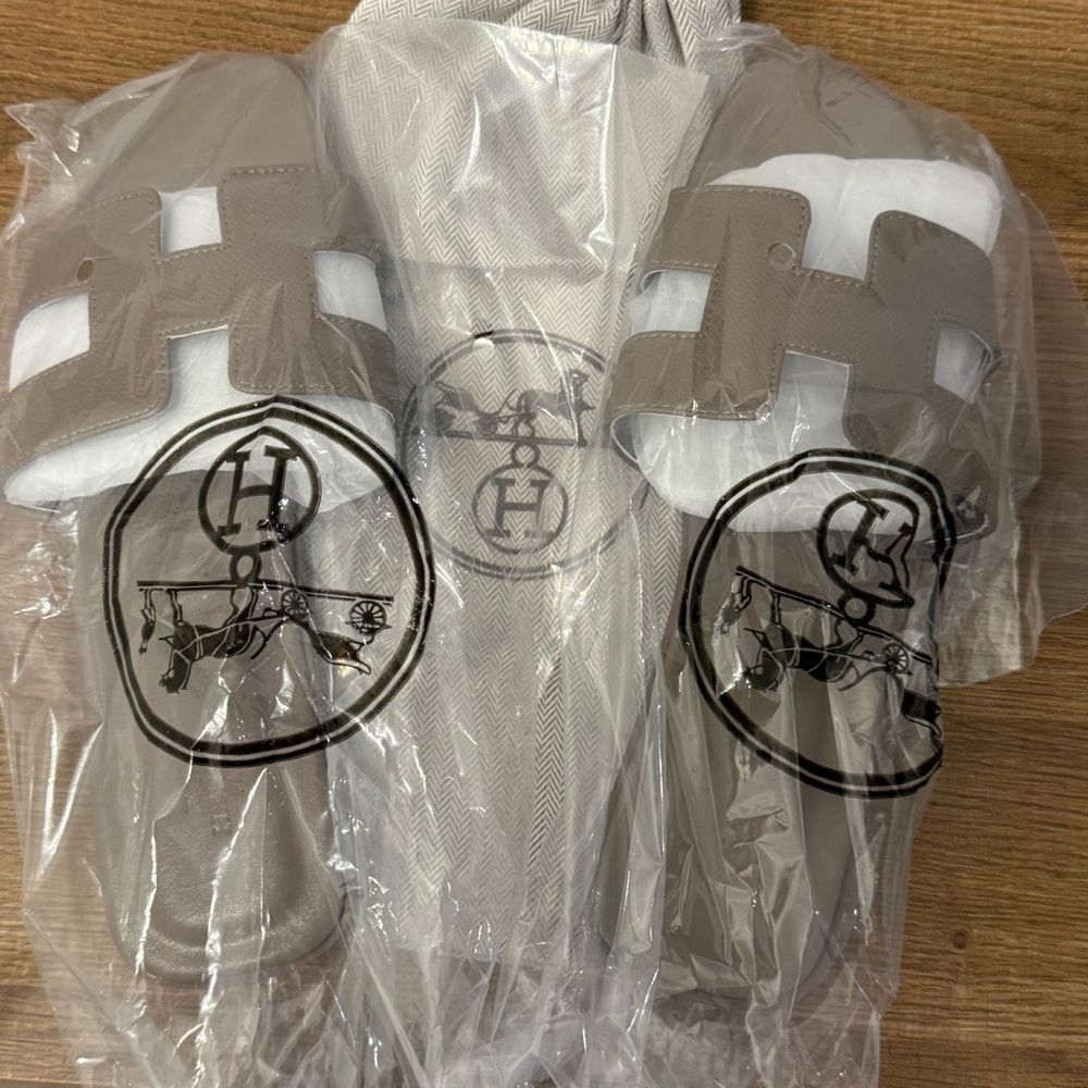 Taupe and White Logo Slides